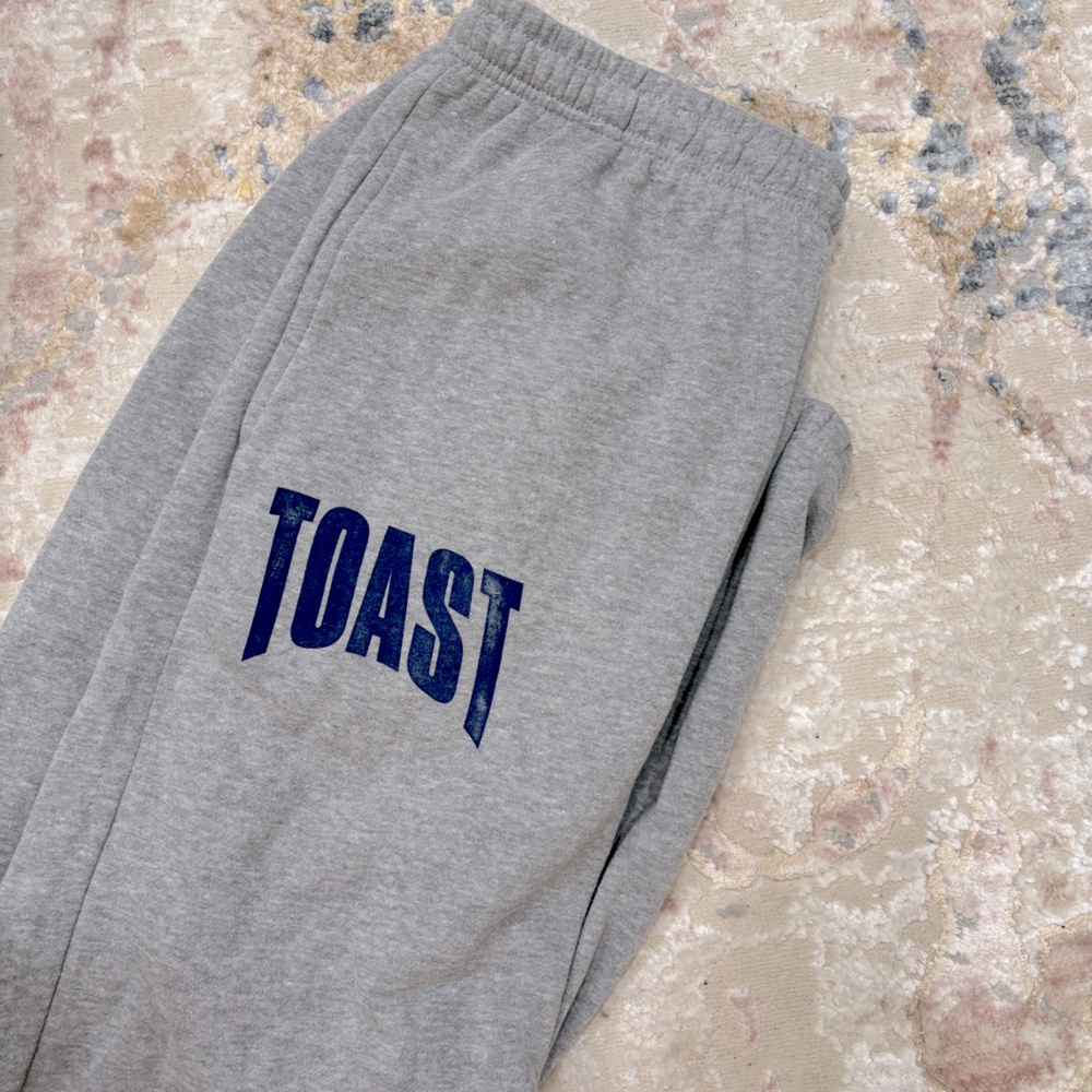 THE TOAST podcast merch sporty sweatpants heather grey